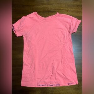 Athleta pink kids size XL fits as a women’s small